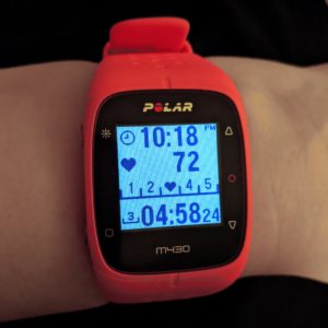 Photo of a Polar M430 watch with time and HR data